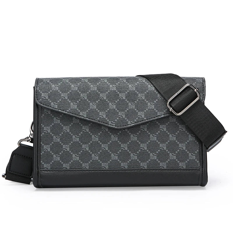 Borsa a tracolla nera in pelle con motivo geometrico, chiusura a patta, cinturino regolabile. Elegante accessorio moda per uomo e donna.