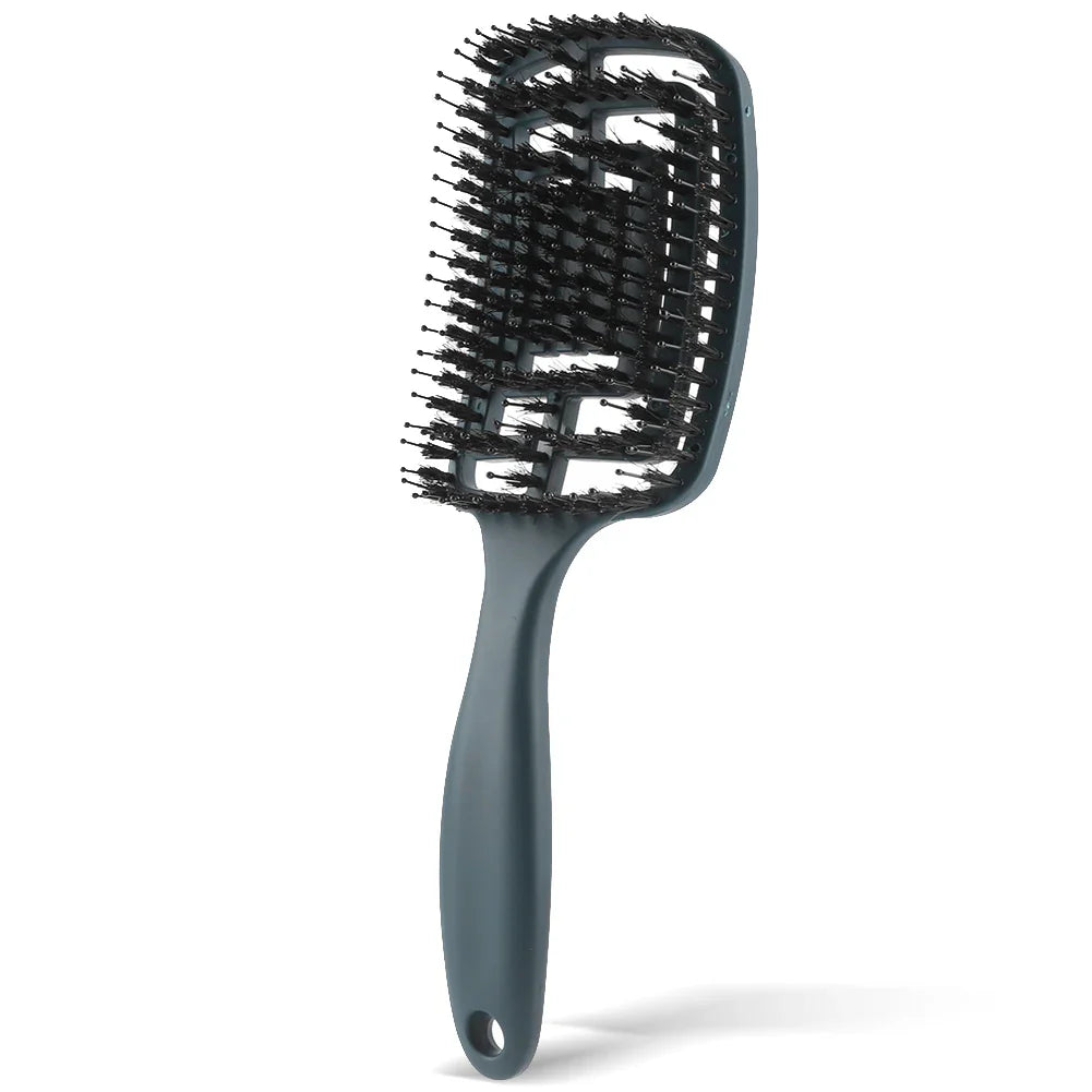 Spazzola per capelli nera con setole flessibili, design ergonomico, ideale per districare e lisciare, adatta a tutti i tipi di capelli.