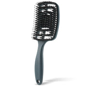 Spazzola per capelli nera con setole flessibili, design ergonomico, ideale per districare e lisciare, adatta a tutti i tipi di capelli.