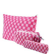 Set di tre astucci a quadretti rosa e bianchi, con cerniera. Ideale per scuola e ufficio. Design moderno e funzionale.