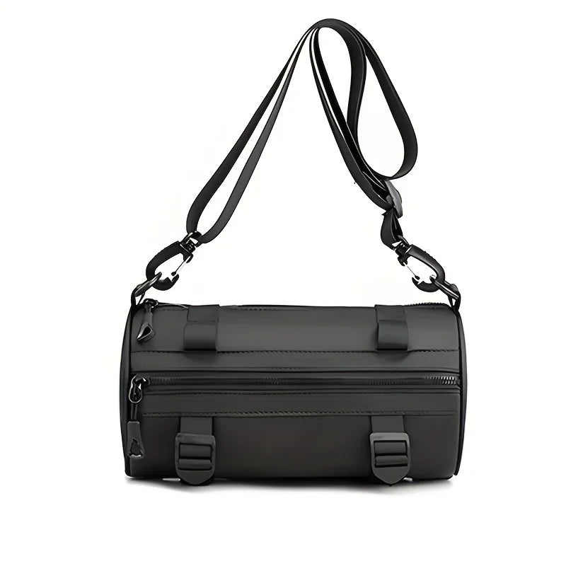 Borsa a tracolla cilindrica nera in pelle, design moderno, con cerniere e fibbie, ideale per moda uomo e donna. Accessorio elegante e versatile.
