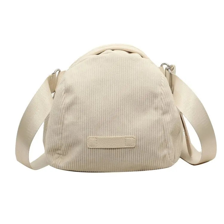 Borsa a tracolla beige in velluto a coste, design casual, con cinghia regolabile. Perfetta per moda donna, accessori eleganti e versatili.