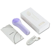 Spazzola pulizia viso in silicone viola con confezione, cavo USB e manuale. Dispositivo skincare elettrico per pulizia profonda e massaggio viso.