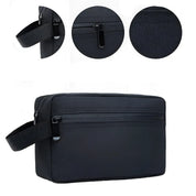 Borsa da toilette nera impermeabile con cerniera, manico laterale, design compatto. Ideale per viaggi, organizzazione accessori bagno.