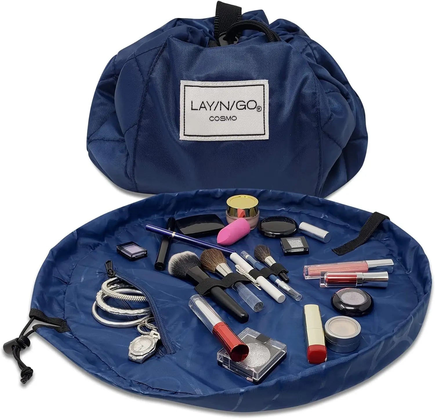 Borsa trucco Lay-n-Go Cosmo blu aperta con cosmetici e accessori, ideale per organizzare e trasportare trucchi, pennelli e gioielli.