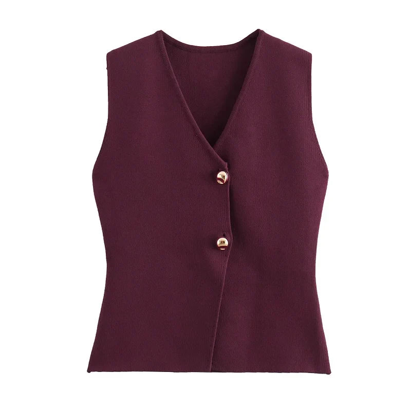 Gilet donna senza maniche bordeaux, chiusura a due bottoni dorati, elegante e moderno, ideale per moda autunnale e invernale.