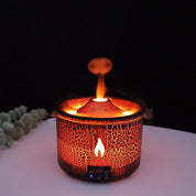 Umidificatore a ultrasuoni con effetto fiamma, design moderno, luce LED calda, ideale per aromaterapia e decorazione ambienti interni.