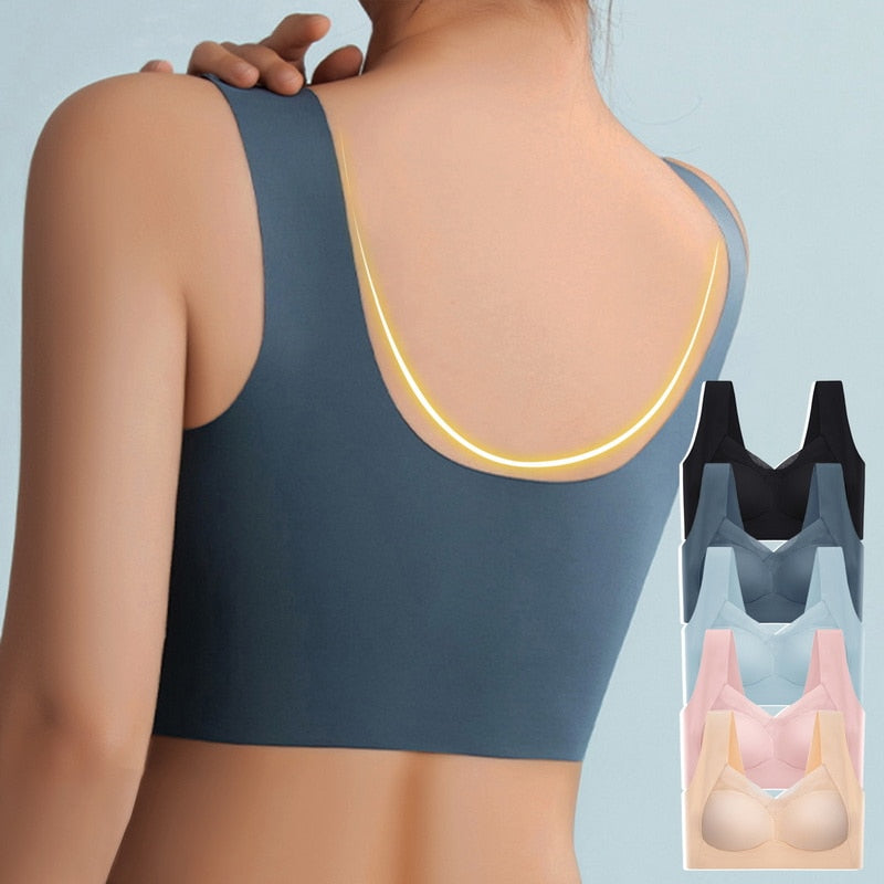 Top sportivo senza cuciture da donna, retro in tessuto traspirante, disponibile in vari colori: nero, blu, rosa, beige. Comfort e supporto ottimali.