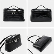 Borsa a tracolla in pelle nera effetto coccodrillo, design elegante, chiusura con zip e lucchetto, manico superiore, ideale per moda donna.