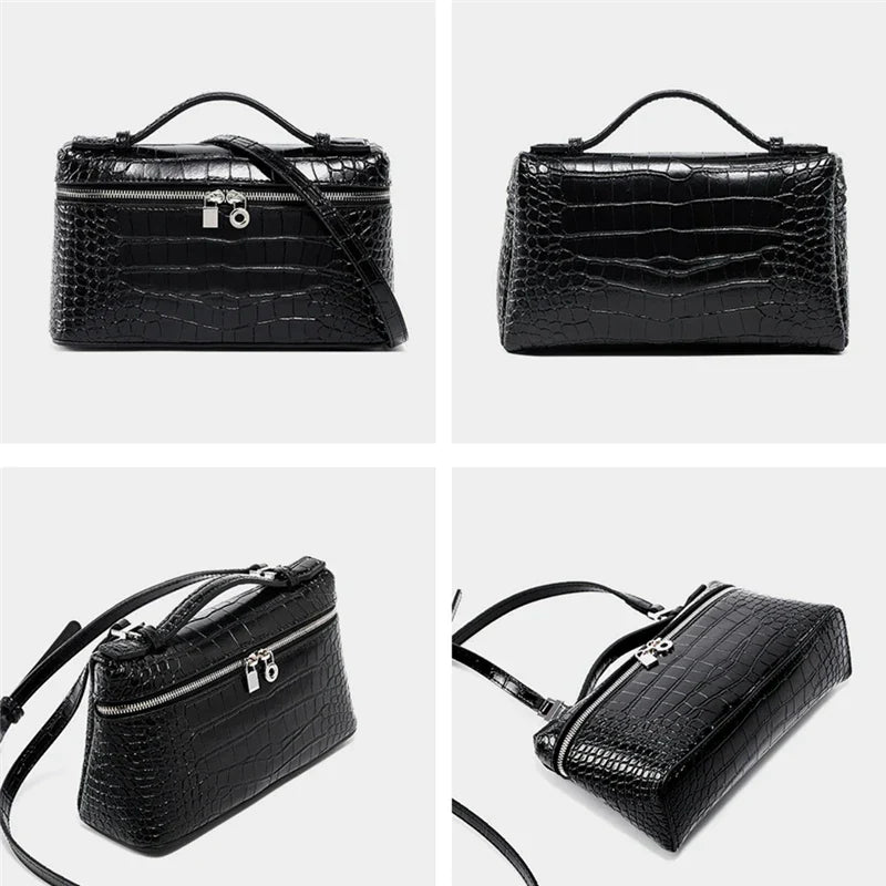 Borsa a tracolla in pelle nera effetto coccodrillo, design elegante, chiusura con zip e lucchetto, manico superiore, ideale per moda donna.