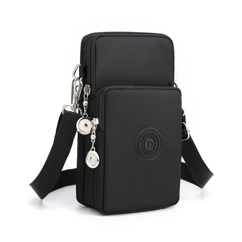 Borsa a tracolla nera multifunzione in nylon, con doppia cerniera e tasche, ideale per uomo e donna. Design moderno e pratico.