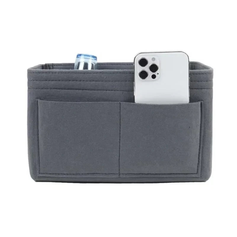 Organizzatore borsa in feltro grigio con tasche, ideale per smartphone e bottiglie. Accessorio pratico per borse, ottimizza lo spazio e l'ordine.