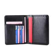 Portafoglio nero in pelle aperto con scomparti per carte di credito e banconote, design elegante e funzionale, accessorio moda uomo e donna.