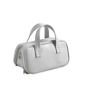 Borsa a mano in pelle bianca, design elegante e moderno, doppio manico, chiusura con zip, ideale per moda donna e accessori di lusso.