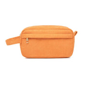 Borsa da toilette arancione in velluto a coste con cerniera, tasca frontale e manico laterale. Elegante e pratica per viaggi e organizzazione.