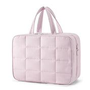 Borsa da viaggio rosa trapuntata, spaziosa e resistente, con manici doppi. Ideale per viaggi, weekend, bagaglio a mano. Design elegante e pratico.