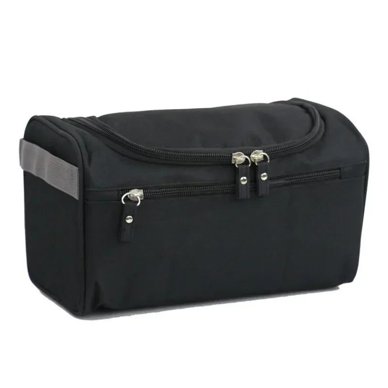 Borsa da toilette nera con doppia cerniera, manico laterale grigio, ideale per viaggi. Design compatto e resistente, perfetta per organizzare accessori.