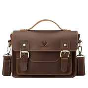 Borsa a tracolla in pelle marrone, design vintage, con fibbie e manico superiore. Ideale per lavoro e uso quotidiano. Elegante e resistente.