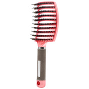Spazzola per capelli rosa con setole nere e manico ergonomico antiscivolo. Ideale per districare e acconciare. Accessorio styling capelli.
