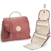 Borsa da viaggio rosa Chantelle, elegante e funzionale, con gancio appendibile e scomparti multipli. Ideale per organizzare accessori e cosmetici.