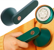 Rimuovi pelucchi elettrico verde, portatile, con pulsante di accensione. Ideale per maglioni, tessuti, abbigliamento. Design ergonomico e moderno.