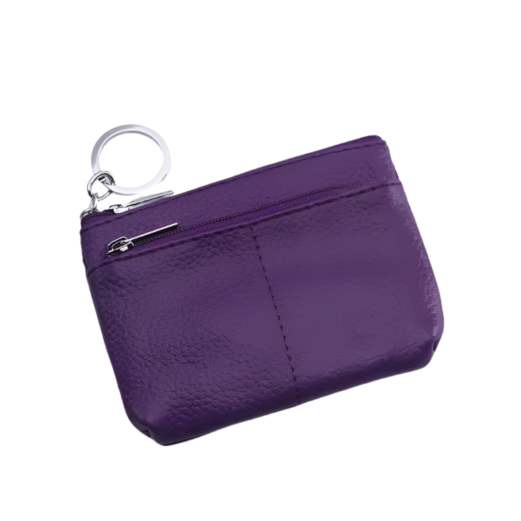Portamonete in pelle viola con cerniera e anello portachiavi in metallo. Accessorio elegante e pratico per organizzare monete e chiavi.