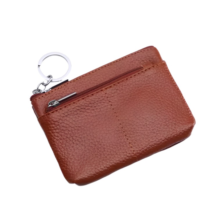 Portamonete in pelle marrone con cerniera e portachiavi, design compatto, ideale per monete e piccoli oggetti. Accessorio elegante e pratico.