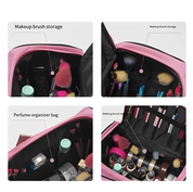 Borsa organizer rosa per trucchi e profumi, con scomparti per pennelli e flaconi. Ideale per viaggi e organizzazione cosmetici.