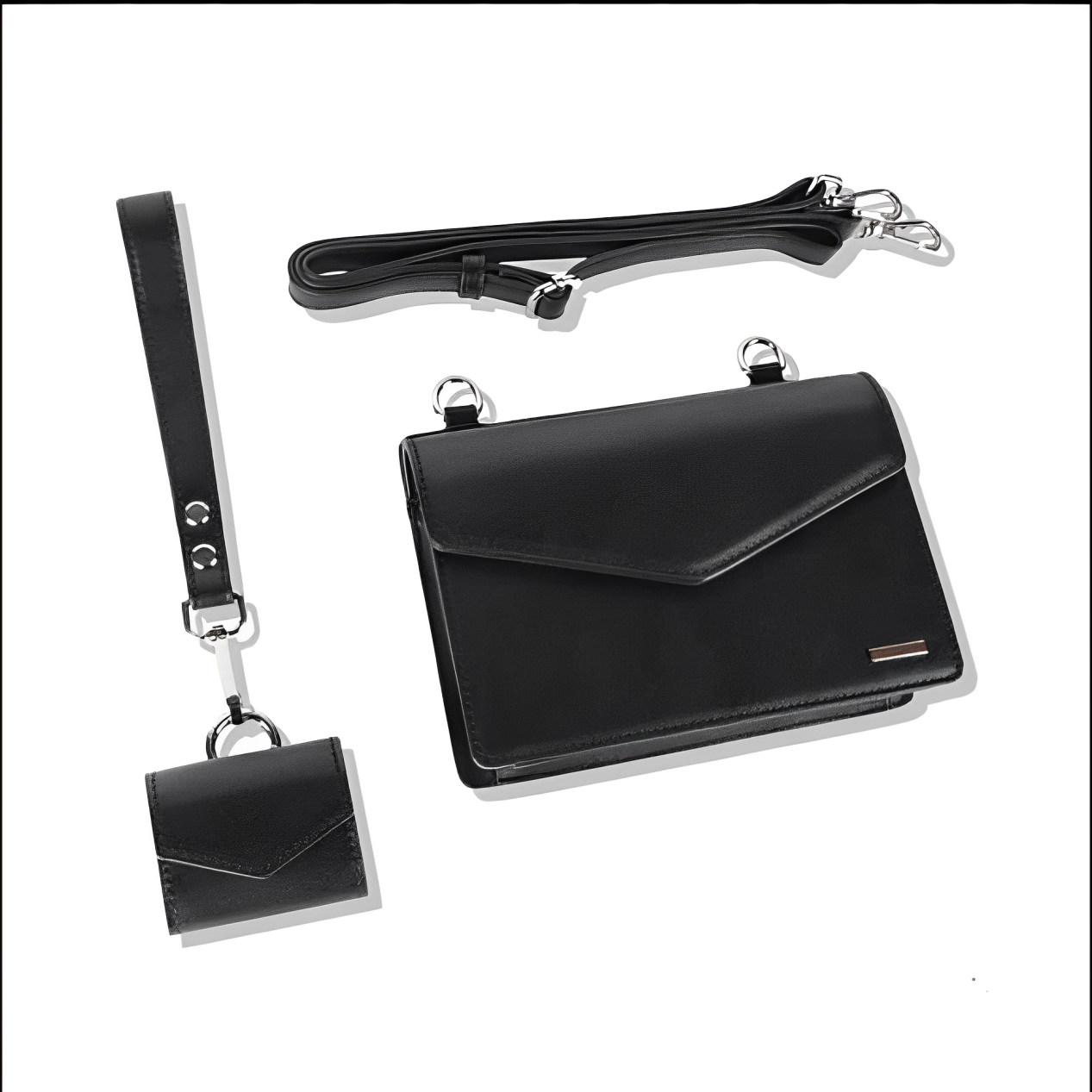 Borsa a tracolla nera in pelle con cinturino regolabile e portachiavi coordinato. Elegante accessorio moda donna.