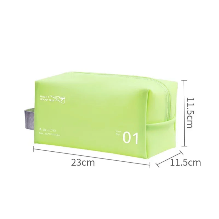 Astuccio da viaggio verde chiaro, dimensioni 23x11,5x11,5 cm, con cerniera e manico laterale. Ideale per cosmetici e accessori.