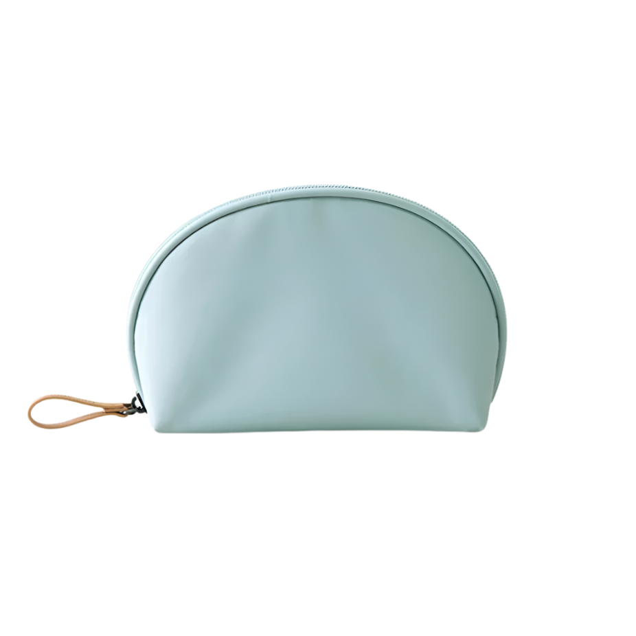 Astuccio cosmetico verde menta in pelle sintetica, chiusura a zip, design elegante e moderno, ideale per viaggio e organizzazione trucco.