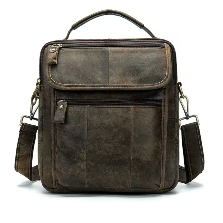 Borsa a tracolla in pelle marrone vintage, design rettangolare, con manico superiore e tasche con cerniera. Accessorio moda uomo elegante e pratico.