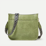 Borsa a tracolla verde in pelle sintetica con cinturino leopardato, design elegante e moderno, perfetta per moda donna e accessori casual.