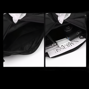 Zaino nero aperto, compartimenti spaziosi, ideale per laptop e accessori. Design moderno, perfetto per lavoro e viaggio. Tasche multiple.