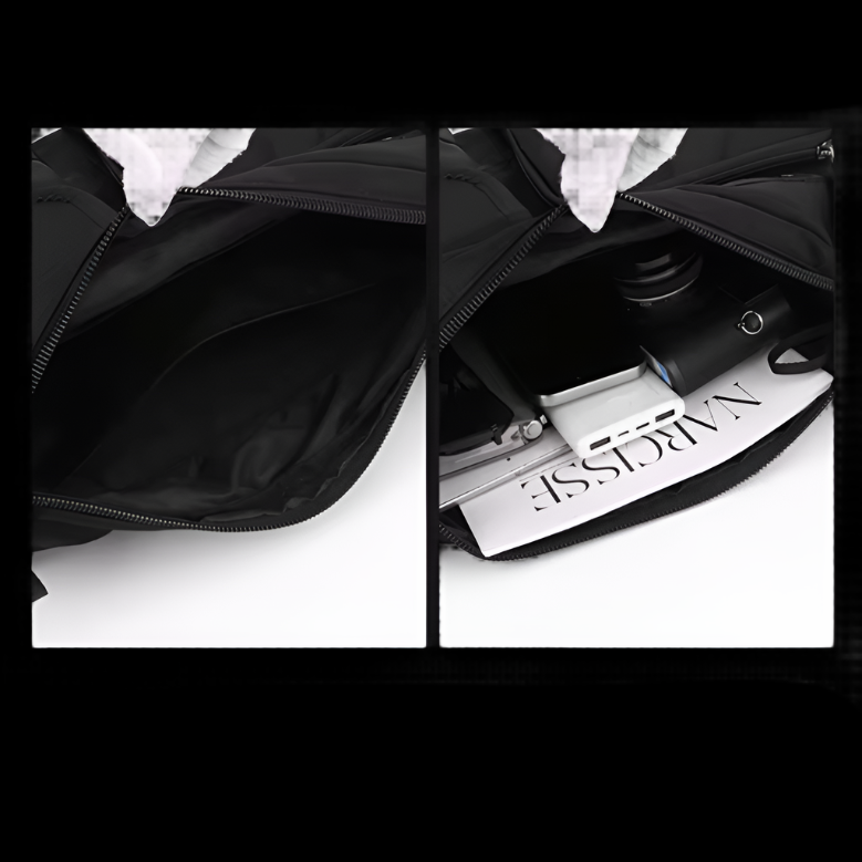 Zaino nero aperto, compartimenti spaziosi, ideale per laptop e accessori. Design moderno, perfetto per lavoro e viaggio. Tasche multiple.