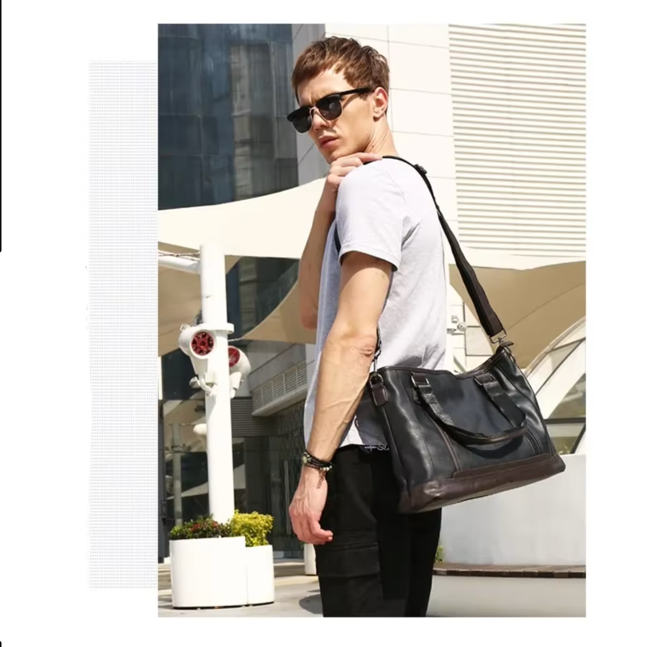 Uomo con occhiali da sole indossa borsa a tracolla in pelle nera, moda urbana, esterno moderno, abbigliamento casual, accessori maschili eleganti.