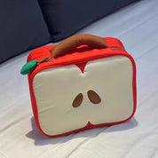 Borsa termica a forma di mela rossa con manico marrone, design creativo per pranzo, ideale per scuola o ufficio, accessorio pratico e originale.