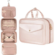 Borsa da viaggio rosa con gancio, scomparti multipli, tasche trasparenti e chiusura a zip. Ideale per cosmetici e accessori da bagno.