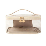 Borsa trasparente da viaggio con cerniera, manico beige e dettagli dorati, ideale per cosmetici. Design elegante e pratico per organizzazione.