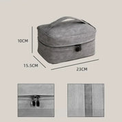 Borsa da viaggio grigia con cerniera, dimensioni 23x15,5x10 cm, manico superiore. Ideale per cosmetici e accessori. Design compatto e pratico.