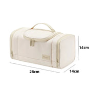 Borsa da viaggio beige 28x14x14 cm, con manico e doppia cerniera, ideale per cosmetici e accessori. Design compatto e funzionale.