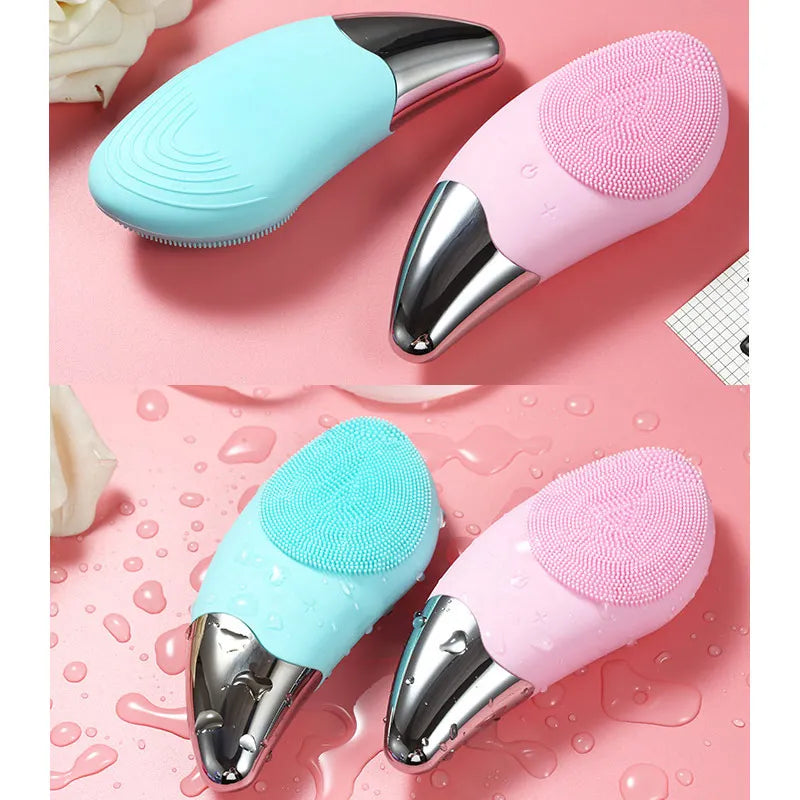 Spazzola viso elettrica in silicone rosa e azzurra, impermeabile, con testina massaggiante e design ergonomico, ideale per pulizia profonda della pelle.