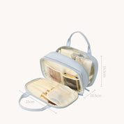 Borsa da toilette da viaggio azzurra, doppio scomparto, trasparente, con manico, dimensioni 25x10.5x16.5 cm, ideale per cosmetici e accessori.