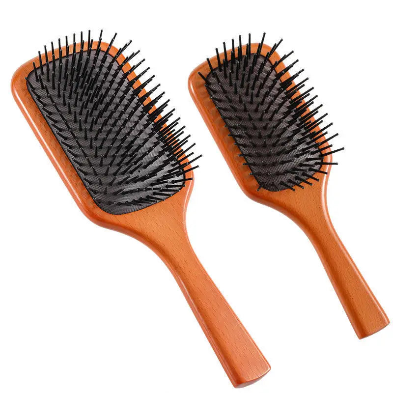 Due spazzole per capelli in legno con setole nere, design rettangolare, ideali per districare e lisciare, perfette per uso quotidiano e professionale.