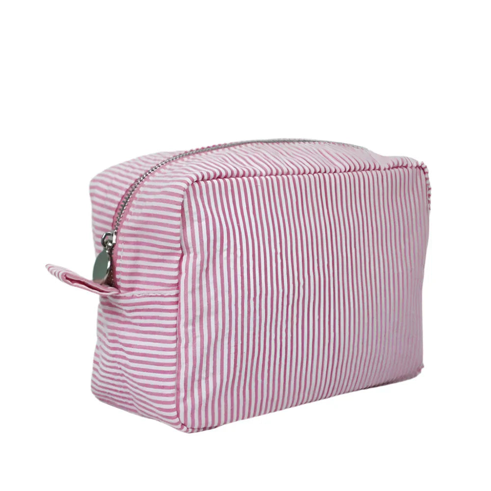Astuccio da viaggio a righe rosa e bianche, chiusura con cerniera, tessuto resistente, ideale per cosmetici e accessori.