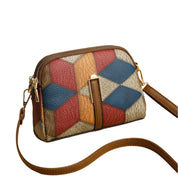 Borsa a tracolla donna in pelle, motivo geometrico multicolore, chiusura con zip, cinturino regolabile, accessorio moda elegante e versatile.