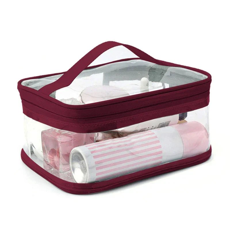 Borsa trasparente da viaggio con manico, ideale per cosmetici e articoli da toeletta. Design compatto, chiusura a zip, bordo bordeaux.