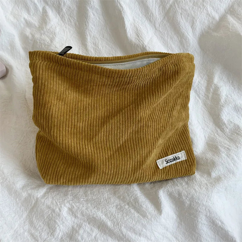 Spaziosa borsa per il trucco da viaggio in velluto a coste con chiusura sicura con cerniera