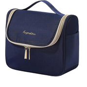 Borsa da toilette blu con cerniera, manico superiore e tasche laterali. Design compatto, ideale per viaggi e organizzazione accessori bagno.