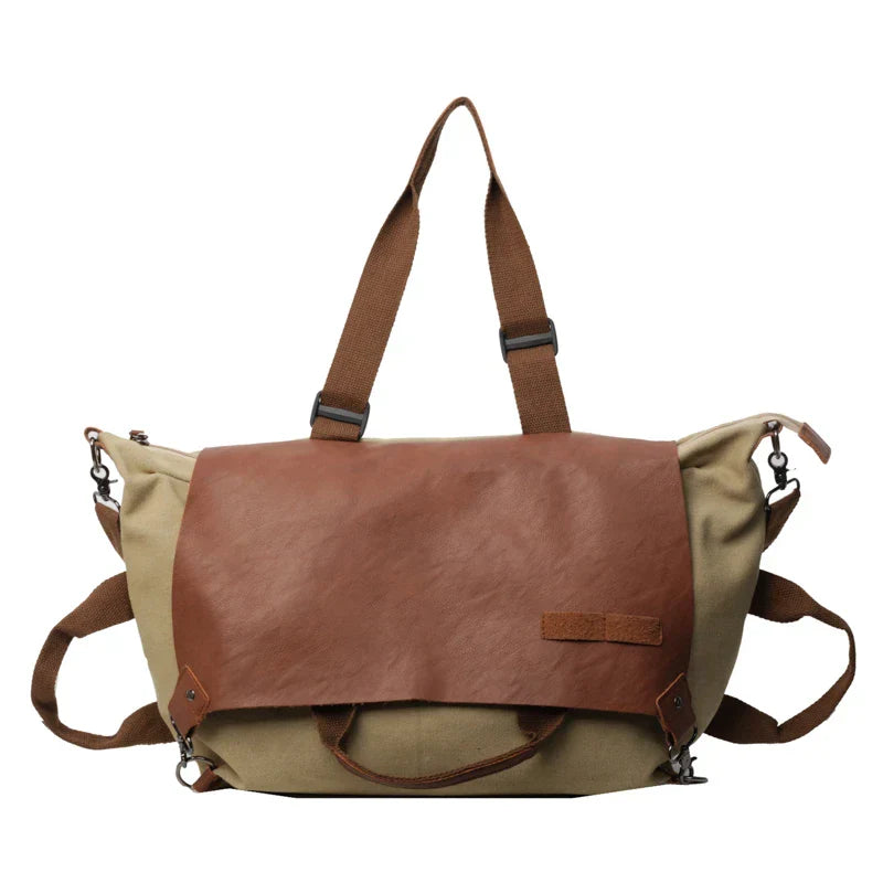Borsa a tracolla in tela e pelle marrone, design vintage, chiusura a zip, manici regolabili, ideale per viaggi e uso quotidiano.